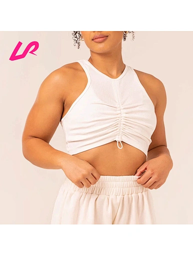 Add a touch of style to your workout with a scrunch crop top. Our trendy and comfortable crop tops offer a flattering fit and easy movement. Available in a range of colors and sizes, shop now to elevate your activewear game with a scrunch crop top.